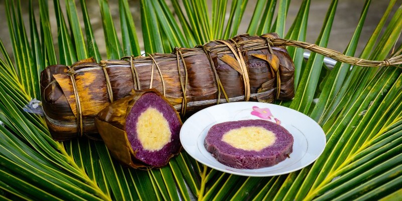 Giải mã ý nghĩa tổng quát về mơ ăn bánh tét